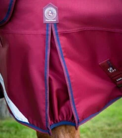 Titan 50g Turnout Rug With Classic Neck Cover 5 Titan 50g Turnout Rug With Classic Neck Cover -Premier Equine Store Burgundy shot 4 fb3e167d 7275 42d0 be0a e6d17f13e0d2