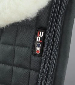 Close Contact Merino Wool European Saddle Pad - GP/Jump Square 17 Close Contact Merino Wool European Saddle Pad - GP/Jump Square -Premier Equine Store Close Contact Merino Wool European Half Lined GP Jump Square Black Natural 4
