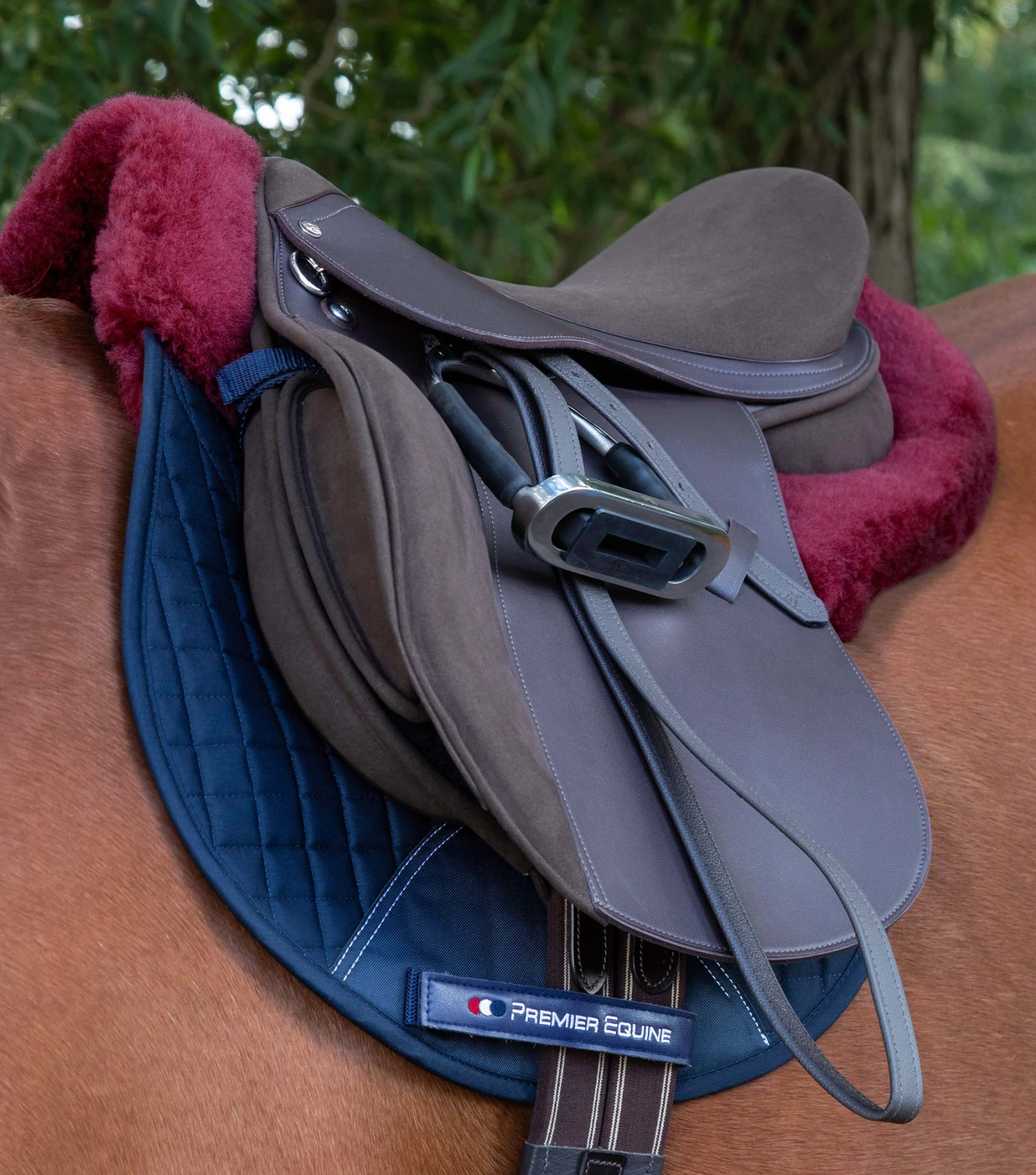 Merino Wool Saddle Pad - GP/Jump Numnah Merino Wool Saddle Pad - GP/Jump Numnah -Premier Equine Store Product image Merino Wool Saddle Pad GP Jump Numnah Navy Burgundy